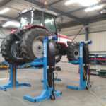 Tractor lifted by SEFAC mobile column lifts